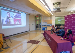 Black professors and college administrators conduct a virtual meeting