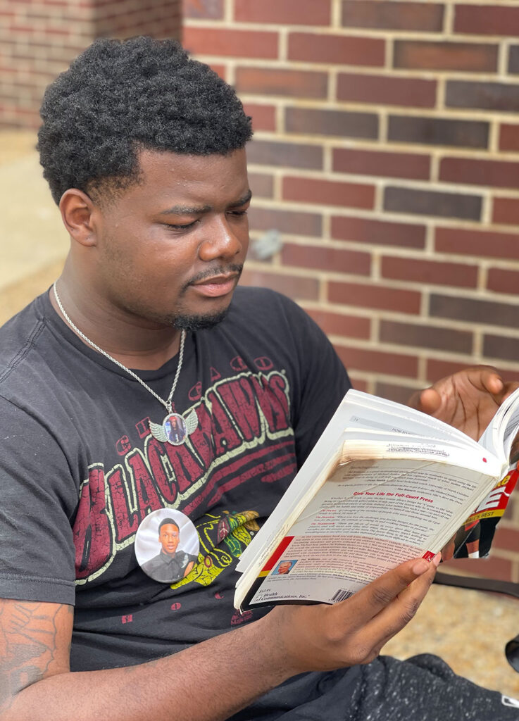 Dual Enrollment student reading
